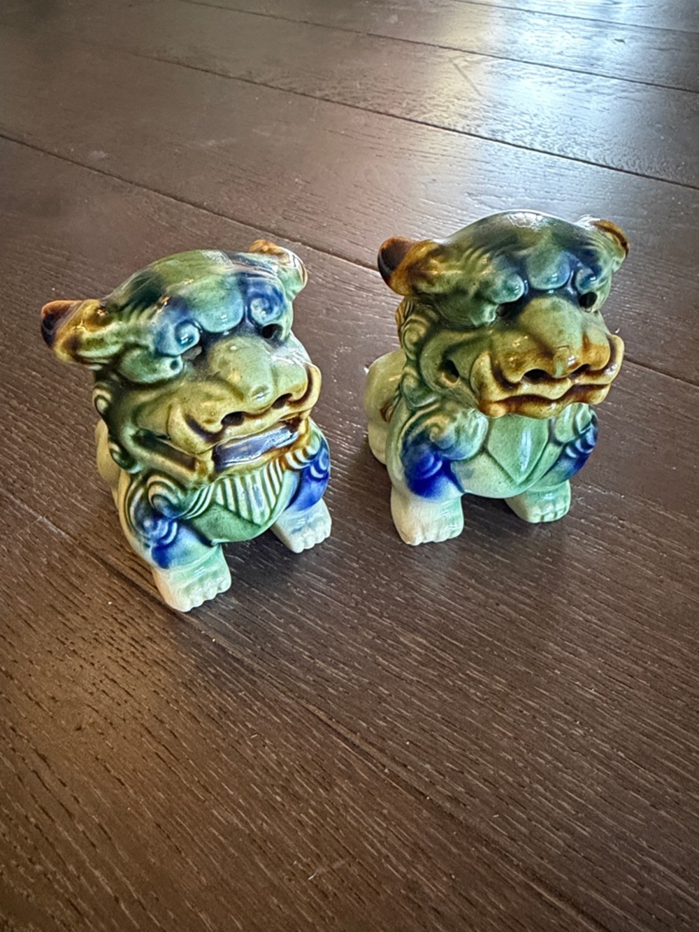 Pair of Glazed Ceramic Foo Dog Figurines in Green and Blue
